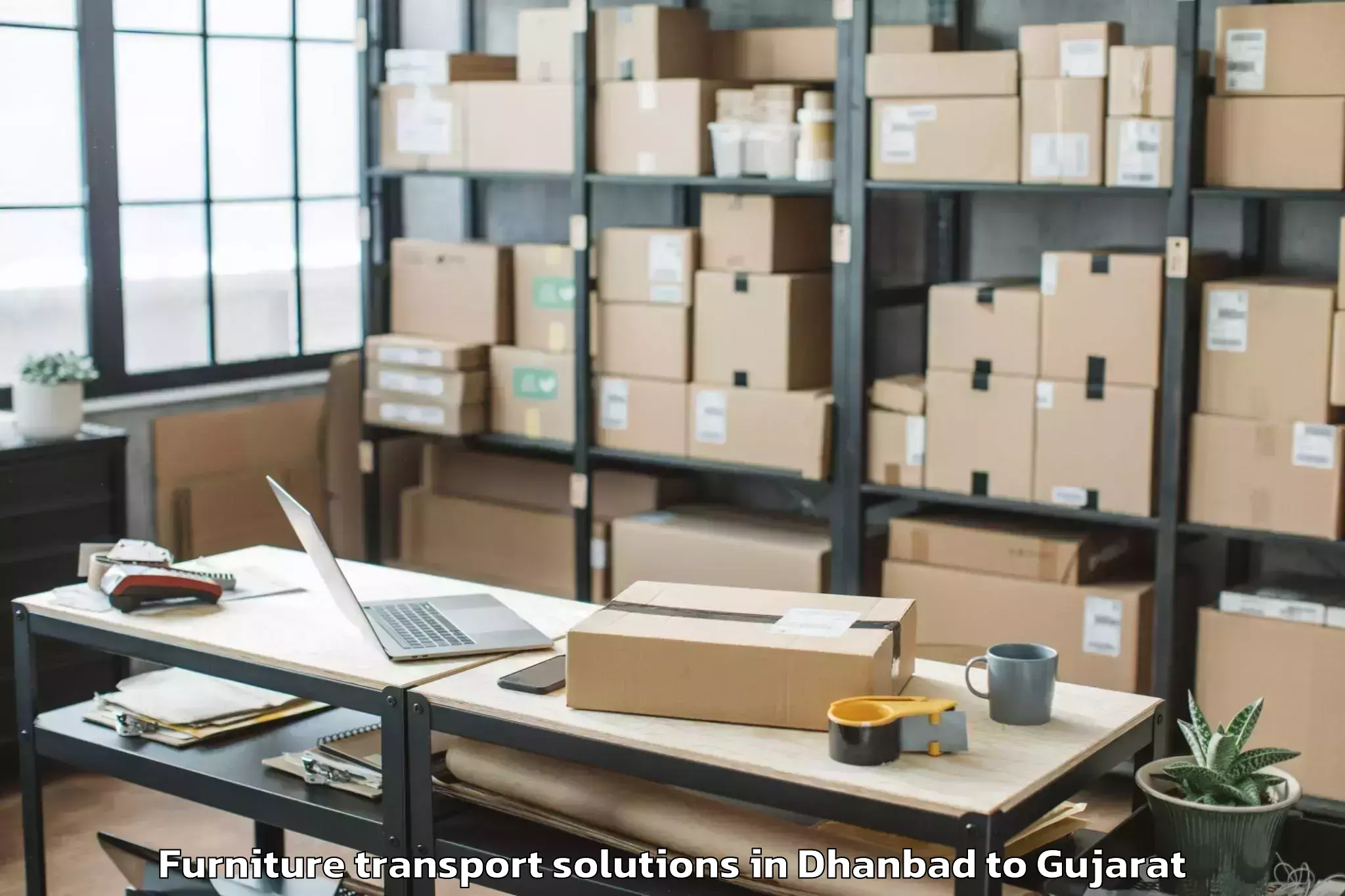 Trusted Dhanbad to Gandhinagar Furniture Transport Solutions